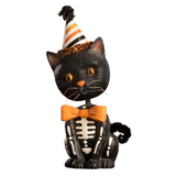 Bobble Bobble Mr. Sourpuss! Sourpuss is here to bobble his way into your hearts. How adorable is he! Sourpuss is dressed in a skeleton costume with an oversized orange bow-tie. He wears a barber striped hat with crepe paper and a black pom on top. He is sure to add a vintage flair to your Halloween décor.

3.5 x 3.5 x 11 in