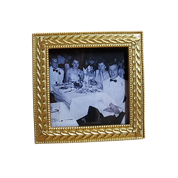 Elevate your cherished memories with this laurel wreath frame. Crafted from resin and glass, the intricate laurel wreath design in gold exudes elegance and sophistication, perfect for displaying your precious moments. 

Resin, Glass.

3 3/4