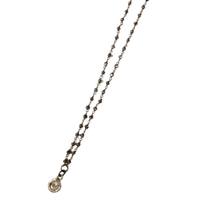 Beautiful, dainty, and the perfect mix of sparkle and natural stone. Our Star Bright Necklace pairs a Swarovski Crystal small pendant with Labradorite and Golden Pyrite chain.

Pendant 3/8"&nbsp;