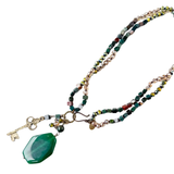 This long necklace can be doubled and hooked together to make a shorter one instantly! Gorgeous green, grey and brownish-red stones make this a stunning piece to wear to work or out on the town! The large India Agate on the bottom of the necklace has a gold key and a small beaded chain that hang next to it.