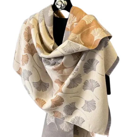 This one size fits all reversible wrap, drapes over and accents any outfit, casual or dressy. It feels and looks like cashmere. A beautiful layering piece!

55% Poly, 45% Viscose.

Dry clean or hand wash cold with light colors, lay flat to dry, iron on lowest setting if need, do not bleach.