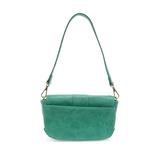 So stylish and chic the Becca baguette bag in true turquoise brings polish to your look. &nbsp;Made in our best-selling vintage vegan leather in of the moment fashion colors, this adorable bag comes with two shoulder straps for versatility, a short strap to carry as a short shoulder or a long adjustable strap to wear as a crossbody bag when you want to be hands free.&nbsp; Even upgrade your look and express your personality by adding one of our coordinating Guitar Straps.


Dimensions: 4.5 in. H x 8 in. W x