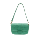 So stylish and chic the Becca baguette bag in true turquoise brings polish to your look. &nbsp;Made in our best-selling vintage vegan leather in of the moment fashion colors, this adorable bag comes with two shoulder straps for versatility, a short strap to carry as a short shoulder or a long adjustable strap to wear as a crossbody bag when you want to be hands free.&nbsp; Even upgrade your look and express your personality by adding one of our coordinating Guitar Straps.


Dimensions: 4.5 in. H x 8 in. W x