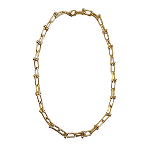 This chunky larger “U” chain Matte gold paperclip chain gives a super easy and fun look to any outfit. Wear it alone or layer it up!

17"