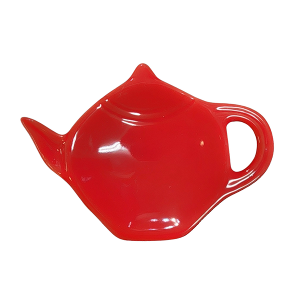 Get one of our cute retro-inspired teapot-shaped tea bag holders to help keep the drips from your teabags from going anywhere!

Vermillion Red color, single glaze lead-free ceramic ware.

Approximately 5
