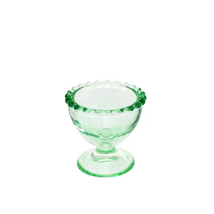 You'll love this darling vintage inspired green glass egg cup! Put your decorated eggs in them, or fill them with spring flowers or some Easter candy - too cute!!!

2.25" Dia x 2.25" H

Hand wash only, not dishwasher safe, not microwave safe.