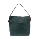 Equally timeless and modern, our best-selling classic hobo comes in rich vegan leather in a gorgeous, vivid deep teal, with a brown strap.&nbsp; This roomy bag, accented with a large front pocket and a snap-in removable brown crossbody, has plenty of room to carry your needs in style.


MAIN BAG

12" h x 14" w x 6" d

Adjustable strap 6"-11"

Magnetic snap top closure

Exterior open pocket

Two snaps to attach insert to act as a lining

Brass-plated hardware

100% Vegan leather (polyurethane)

REMOVABLE INS