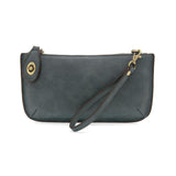 Our most popular bag, this mini clutch, with its sleek silhouette, is as gorgeous as it is versatile.&nbsp; Features include a polished turn lock, six card slots, and an interior zipper for change.&nbsp; It can be styled in many ways, with removable straps to alternate between wallet, crossbody, and wristlet!  &nbsp;5"H x 9.5"W x 1"D