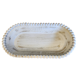 You'll enjoy decorating with this whitewashed beaded wood bowl! The oval shape is perfect for those narrow spaces.

&nbsp;3.5" H x 17" W x 8.5" D

Mango Wood&nbsp;

Decorative Use Only&nbsp;