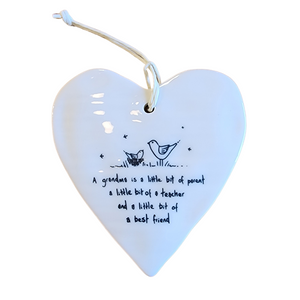 Our "A grandma is a little bit of parent a little bit of a teacher and a little bit of a best friend" Porcelain Heart Ornament makes a heartfelt gift!

Approximately 3&nbsp;1/2"&nbsp;w x 4"&nbsp;h