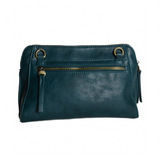 Retro styling crafted in antiqued vegan leather gives this rich classic tea. clutch a vintage vibe. The removable woven wrist strap is the finishing touch on this stylish bag so you can wear it as a wristlet, a clutch, or a crossbody with the included removable shoulder strap!





6.75"H x 9.75"W x 2.25"D

Removable and adjustable crossbody strap 22"-26"

Removable long wristlet strap 7.5" long

Zippered top closure

Interior zippered pocket

Exterior back zipper pocket

Brass plated hardware

100% vegan l