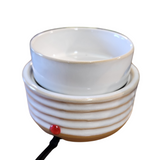 We love the style of this wax melter. You can use it without the bowl and stick a candle on top, or put the bowl on and put your favorite melts in.&nbsp;

The plug has an off-and-on switch.&nbsp;

Dimensions: 4"H x 4.5"W