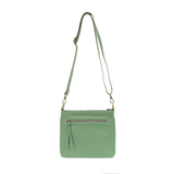 Your perfect goes with anything bag! In just the right size to carry your essentials, this seafoam pebbled vegan leather bag has multiple pockets and a top zip closure for security, so you are ready for anything your day brings. Add one of our interchangeable Guitar Straps to add your own style!


Product Details
Dimensions: 11 in. W x 11.25 in. H x 3.5 in. D
Magnetic Snap Closure
2 Open and 1 Zipper Interior Pockets
2 Exterior Open Pockets and 1 Back Zipper Pocket
12x18 in. Drop Adjustable and Detachable C