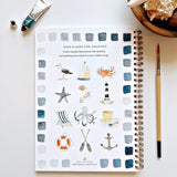 Watercolor workbooks are just like a coloring book, but with watercolor! Enjoy this peaceful hobby on your own, with kids, and with friends. Makes a wonderful gift. Perfect for artists of any age. This Seaside book has beautiful illustrations of boats, crabs, anchors, oars and more for you to paint!

12 beginner-friendly, lightly sketched illustrations

Simple step-by-step instructions and example

Lay flat spiral pages for easy painting

Durable 120 lb watercolor paper

Travel ready 6.5 inch x 9 inch size
