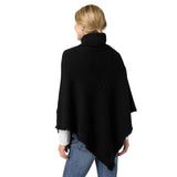 The epitome of cozy, this everyday luxury poncho is crafted from a soft knit fabric with a rich cable texture that adds depth and dimension. Designed with a relaxed drape and a comfortable turtleneck, it delivers effortless warmth while maintaining an elevated, easy silhouette. The lightweight feel allows for comfortable layering without bulk, making it a versatile piece for both casual and polished styling. Soft. Luxe. and made for all day comfort, this poncho brings refined ease and timeless appeal to any