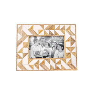 This photo frame will add a unique farmhouse touch to your decor and grab the attention of anyone who enters your home. The white resin geometric pattern highlights the natural grain of the mango wood, creating an eye-catching display for your most treasured photo memories.  7"H&nbsp; x 0.5"D x 9" L&nbsp;