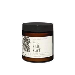 Sea salt surf flaunts notes of jasmine, followed by sweet cream and a hint of driftwood. A top seller, this scent creates a memory of the warm salt air, sweet adult drinks, and beach thoughts. The perfect addition for summer!  Scent notes: wood | cream | jasmine  4 oz amber glass jar with black plastic lid.