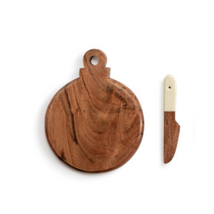 Set the table in style with this mini wood serving board that says "Be Merry" at the top. Included is a wooden spreader with a cream handle. It is so fun to serve your favorite cheeses or munchies on, or as a fun gift idea for your secret Santa!

5"w x 6.5"h

Acacia wood, Handwash Only, Food Safe