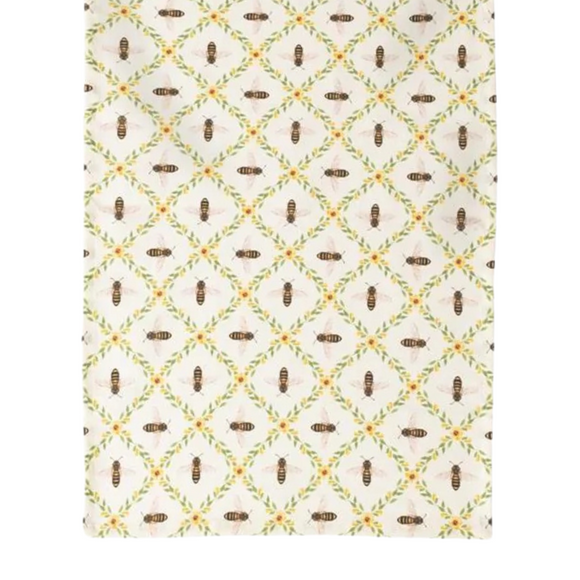 Such a little towel to brighten your kitchen! This towel has a vine and yellow diamond pattern with bees inside each diamond on a cream background. 

27