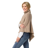 The epitome of cozy, this everyday luxury poncho is crafted from a soft knit fabric in beige heather, with a rich cable texture that adds depth and dimension. Designed with a relaxed drape and a comfortable turtleneck, it delivers effortless warmth while maintaining an elevated, easy silhouette. The lightweight feel allows for comfortable layering without bulk, making it a versatile piece for both casual and polished styling. Soft. Luxe. and made for all day comfort, this poncho brings refined ease and time