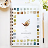The Birds Watercolor Workbook includes 12 bird illustrations with an example of the finished painting, step-by-step instructions, and a lightly illustrated sketch for you to paint. It's just like a coloring book, but with watercolor! Enjoy this peaceful painting hobby on your own, with children, or with friends. Makes a wonderful gift and is perfect for artists of any age.

Details: - 12 beginner-friendly illustrations

Thick 120lb watercolor paper

&nbsp;Lay-flat pages with spiral binding for hassle-free p