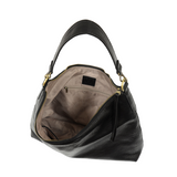 This oversized, slouchy, cool hobo bag is made of tumbled buffalo grain black vegan leather, which gives it that casual boho chic look! With two included removable shoulder straps, you can wear it as a short shoulder bag or a crossbody bag.  Dimensions: 13.5 in. H x 16 in. W x 3.5 in. D