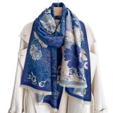 This one size fits all reversible wrap, drapes over and accents any outfit, casual or dressy. It feels and looks like cashmere. A beautiful layering piece!

55% Poly, 45% Viscose.

Dry clean or hand wash cold with light colors, lay flat to dry, iron on lowest setting if need, do not bleach.