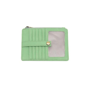 We love this mini wallet in a bouncy mint vegan leather! It is full of style and will hold your license and up to six credit cards. The zipper pocket is roomy enough for your change and cash, and a pocket is on the back.&nbsp; This mini wallet is perfect for you, but it makes an awesome gift!

DIMENSIONS: 4 IN. H X 5.5 IN. W X .25 IN. D

ZIPPERED TOP CLOSURE ON EDGE

6 CREDIT CARD POCKETS

ID WINDOW POCKET

EXTERIOR PASSPORT POCKET

STRIPED LINING

BRASS PLATED HARDWARE

100% VEGAN LEATHER (POLYURETHANE)