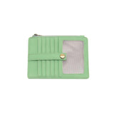 We love this mini wallet in a bouncy mint vegan leather! It is full of style and will hold your license and up to six credit cards. The zipper pocket is roomy enough for your change and cash, and a pocket is on the back.&nbsp; This mini wallet is perfect for you, but it makes an awesome gift!

DIMENSIONS: 4 IN. H X 5.5 IN. W X .25 IN. D

ZIPPERED TOP CLOSURE ON EDGE

6 CREDIT CARD POCKETS

ID WINDOW POCKET

EXTERIOR PASSPORT POCKET

STRIPED LINING

BRASS PLATED HARDWARE

100% VEGAN LEATHER (POLYURETHANE)