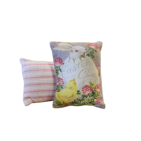 This adorable mini vintage postcard pillow has a bunny coming out of an egg with a flower in his month with 