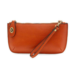 Our most popular bag, this mini clutch, with its sleek silhouette, is as gorgeous as it is versatile.&nbsp; Features include a polished turn lock, six card slots, and an interior zipper for change.&nbsp; It can be styled in many ways, with removable straps to alternate between wallet, crossbody, and wristlet!  &nbsp;5"H x 9.5"W x 1"D