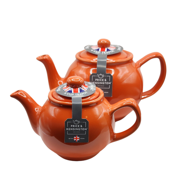 When it's time for a spot of tea, reach for one of our stoneware teapots, which can absorb the heat of boiling water without cracking. Likewise, the beautiful exterior is protected with a gloss to prevent the paint from warping or rippling. The classic bulbous shape allows tea leaves or bags to move freely for just the right amount of flavoring. 

The burnt orange teapot is available in 2-cup or 6-cup size