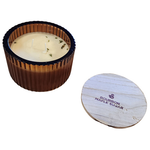You'll love our new cathedral bowl candle style and size! This bourbon maple sugar candle has been poured into a pretty brown-patterned glass and comes with a wooden lid.

Mild bourbon notes blend with a rich aroma of brown sugar and maple!

Filled with 6.5 oz. of American Soybean WaxTM. Measures 4.25"W x 3.25 "H (with lid) with a 40+ hour burn time