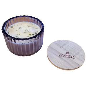 You'll love our new cathedral bowl candle style and size! This lavender &amp; lemongrass candle has been poured into a pretty lavender-patterned glass and comes with a wooden lid.

It is a lovely spring fragrance with a potpourri twist of lavender and citrus notes.

Filled with 6.5 oz. of American Soybean WaxTM. Measures 4.25"W x 3.25 "H (with lid) with a 40+ hour burn time