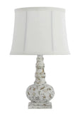 This striking accent lamp f features a casually elegant finish in silver and white. A classic look for any room in the house. This little lamp adds the perfect touch to a powder room bedroom, living room, bookcase, or small accent table. Use it as a night light or accent light.   25-watt bulb not included.  15" H x 9.25" D with lampshade