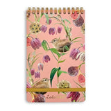 If you like taking notes like we do, you'll love our new reporter-style top spiral notepads!  This pink cover has a wren in the center surrounded by purple tulips and figs. We love that it has a yellow-gold elastic closure below to keep everything together!  150 Pages.  Approximately 4.5"W x 7.25"H