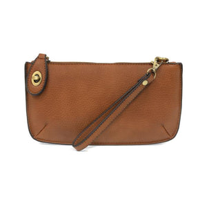 Our most popular bag, this mini clutch, with its sleek silhouette, is as gorgeous as it is versatile.&nbsp; Features include a polished turn lock, six card slots, and an interior zipper for change.&nbsp; It can be styled in many ways, with removable straps to alternate between wallet, crossbody, and wristlet!  &nbsp;5"H x 9.5"W x 1"D