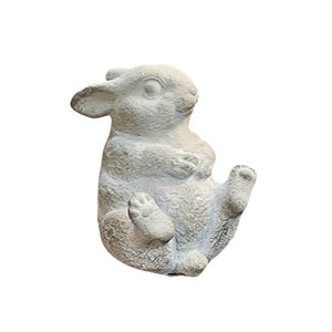 Bring a little whimsey to your outdoors or your indoor decor this year with this sweet cement bunny that is sitting back with his feet in the air!

4.25" H x 4.25" W