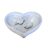 Love at first sight! This uniquely designed cement heart planter is a great addition to your home or garden. The 2 little birds are detachable, and you can place them anywhere you want on the edge of the heart.&nbsp;

7.67"W x 7.08"D x 2.55"H