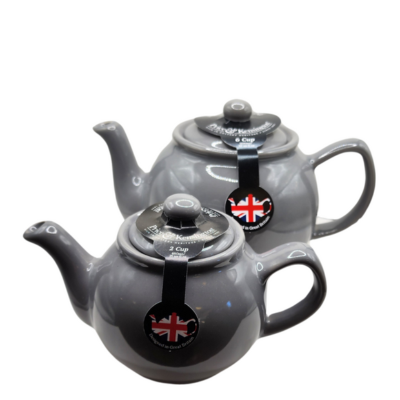 When it's time for a spot of tea, reach for one of our stoneware teapots, which can absorb the heat of boiling water without cracking. Likewise, the beautiful exterior is protected with a gloss to prevent the paint from warping or rippling. The classic bulbous shape allows tea leaves or bags to move freely for just the right amount of flavoring. 

Our Charcoal teapot is available in 2-cup or 6-cup size