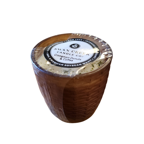You'll love our cathedral small vase candle. This cinnamon donuts and coffee candle has been poured into a pretty basketweave frosted brown glass.

A fragrant blend of warm cinnamon donuts and coffee notes.
Filled with 4.5 oz. of American Soybean WaxTM. Measures 3