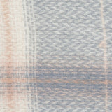 Thoughtfully designed, our Gray Caroline Plaid Scarf features a unique herringbone weave incorporated into a classic winter plaid creating texture and visual interest. Made from 100% polyester, this medium-weight scarf is gender-neutral and incredibly soft to the touch, ensuring your comfort and warmth on chilly days. Whether draped over your shoulders or wrapped around your neck, it's the perfect finishing piece to compliment your winter wardrobe.&nbsp;

75" L x 27.5" W&nbsp; &nbsp; Finished with approxima