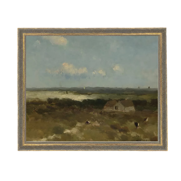 Peaceful and serene, this artwork of a farm with the coast in the background will be one of your favorite pieces of artwork you'll own! Printed on premium canvas fabric for a lasting, textured finish and has a handcrafted ornate frame  in a greyed blue and gold color that adds a classic charm.  Comes with a paper backing and hanging hardware for easy installation.

Made in the USA: Proudly crafted with quality and care. 

Care Instructions: Keep canvas dry to maintain its quality. If smudged 
