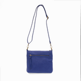 Your perfect goes with anything bag! In just the right size to carry your essentials, this stunning cobalt colored pebbled vegan leather bag has multiple pockets and a top zip closure for security, so you are ready for anything your day brings. Add one of our i
interchangeable Guitar Straps to add your own style!


Product Details
Dimensions: 11 in. W x 11.25 in. H x 3.5 in. D
Magnetic Snap Closure
2 Open and 1 Zipper Interior Pockets
2 Exterior Open Pockets and 1 Back Zipper Pocket
12x18 in. Drop Adjustabl