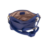 Your perfect goes with anything bag! In just the right size to carry your essentials, this stunning cobalt colored pebbled vegan leather bag has multiple pockets and a top zip closure for security, so you are ready for anything your day brings. Add one of our i
interchangeable Guitar Straps to add your own style!


Product Details
Dimensions: 11 in. W x 11.25 in. H x 3.5 in. D
Magnetic Snap Closure
2 Open and 1 Zipper Interior Pockets
2 Exterior Open Pockets and 1 Back Zipper Pocket
12x18 in. Drop Adjustabl