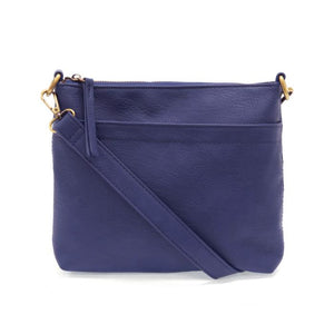Your perfect goes with anything bag! In just the right size to carry your essentials, this stunning cobalt colored pebbled vegan leather bag has multiple pockets and a top zip closure for security, so you are ready for anything your day brings. Add one of our i
interchangeable Guitar Straps to add your own style!


Product Details
Dimensions: 11 in. W x 11.25 in. H x 3.5 in. D
Magnetic Snap Closure
2 Open and 1 Zipper Interior Pockets
2 Exterior Open Pockets and 1 Back Zipper Pocket
12x18 in. Drop Adjustabl