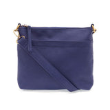Your perfect goes with anything bag! In just the right size to carry your essentials, this stunning cobalt colored pebbled vegan leather bag has multiple pockets and a top zip closure for security, so you are ready for anything your day brings. Add one of our i
interchangeable Guitar Straps to add your own style!


Product Details
Dimensions: 11 in. W x 11.25 in. H x 3.5 in. D
Magnetic Snap Closure
2 Open and 1 Zipper Interior Pockets
2 Exterior Open Pockets and 1 Back Zipper Pocket
12x18 in. Drop Adjustabl