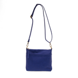 Your perfect goes with anything bag! In just the right size to carry your essentials, this stunning cobalt colored pebbled vegan leather bag has multiple pockets and a top zip closure for security, so you are ready for anything your day brings. Add one of our i
interchangeable Guitar Straps to add your own style!


Product Details
Dimensions: 11 in. W x 11.25 in. H x 3.5 in. D
Magnetic Snap Closure
2 Open and 1 Zipper Interior Pockets
2 Exterior Open Pockets and 1 Back Zipper Pocket
12x18 in. Drop Adjustabl