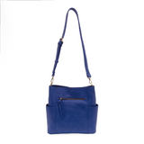 Casual and carefree crossbody in super soft pebble grain vegan leather! Our Kayleigh bucket bag in a stunning cobalt blue&nbsp;comes with a smaller bag that can be carried inside or used alone! The convenient side pockets of this bucket bag can carry your water bottle, phone or glasses.&nbsp;


11" W X 11.25" H X 3.5"
Magnetic Snap Closure
2 open and 1 zipper interior pockets
2 exterior open pockets and 1 back zipper pocket
12- 18" adjustable drop and detachable crossbody strap with lobster claw clasps
Brus