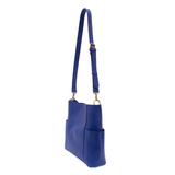 Casual and carefree crossbody in super soft pebble grain vegan leather! Our Kayleigh bucket bag in a stunning cobalt blue&nbsp;comes with a smaller bag that can be carried inside or used alone! The convenient side pockets of this bucket bag can carry your water bottle, phone or glasses.&nbsp;


11" W X 11.25" H X 3.5"
Magnetic Snap Closure
2 open and 1 zipper interior pockets
2 exterior open pockets and 1 back zipper pocket
12- 18" adjustable drop and detachable crossbody strap with lobster claw clasps
Brus